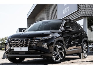Hyundai Tucson 1.6 T-GDI PHEV Comfort 4WD | Camera | Keyless | Panodak | Stoel- & Stuurwielverwarming | 19"