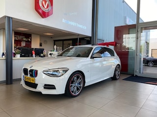 BMW M135i xDrive High Executive,Performance,6 Cilinder,Schuifkanteldak,Leder&Stoelverwarming,Harman Kardon,Navigatie,Achteruitrijcamera,Climate&Cruisecontrol,Spraakbediening,Keyless,18 Inch Lmv