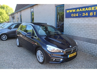 BMW 2-serie Tourer 218i Corporate Lease High Executive Luxury Leder Panoramadak Trekhaak 17" velgen