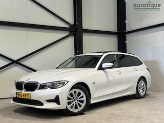 BMW 3-serie Touring 320e Business Aut. | panorama | navi | trekhaak |