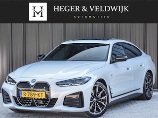 BMW i4 eDrive40 High EXECUTIVE 84 kWh | M-SPORT | SCHUIFDAK | SHADOW-LINE | NL- AUTO | CAMERA | HEAD-UP | TREKHAAK | MEMORY SEATS | AMBIANCE INTERIEUR |