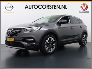 Opel Grandland X T131PK Autom. AGR-Comfort Stoelen Apple Carplay Android Auto Navi Ecc Elek.Achterklep Stuur/Stoelverwarming Cruise Control Pdc Keyless Led Business Executive Regen/Lichtsensor Dodehoeksensor Rijstrooksensor Verkeersbordlezer Winterpakket DAB+ Lmv 18" 1.2 Turbo 1e Eigenaar