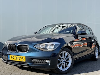 BMW 1-serie BWJ 2012 116i 136 PK Business 84000KM!! TREKHAAK AFN. / AIRCO / NAVI / CRUISE / BLUETOOTH / PDC ACHTER / MULTIFUNCT. STUUR / LMV 16 INCH / ISOFIX