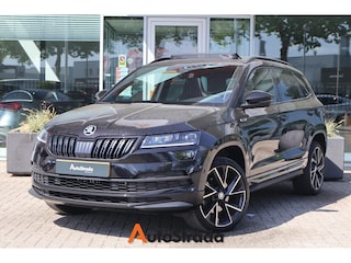 Skoda Karoq 1.5 SportLine TSI ACT 150pk | Canton | Keyless | Adaptive | Virtual | Trekhaak | Camera | Pano