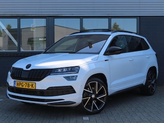 Skoda Karoq 1.5 TSI ACT Sportline Business | panodak | camera | voorruitverwarming | stoelverwarming | achterbankverwarming