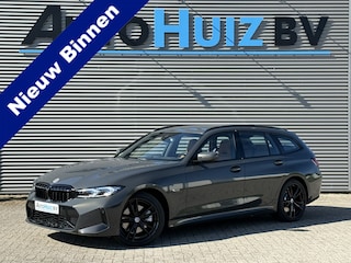 BMW 3-serie Touring 330e M Sport Trekhaak 19 Inch Carplay Achteruitrijcamera M Performance Stoelen Head-Up Display Dravit Grau Metallic Keyless Entry