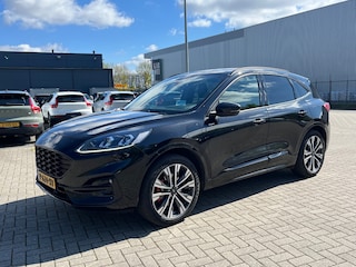 Ford Kuga 2.5 PHEV ST-Line X | Pano-dak | Trekhaak | Camera | 20 inch | Style Pack | Elektr. Klep | Head-Up Display | Full LED verlcihting | B&O audio | Half leder | Elektr. stoel | Winter-pack | Stuur & Stoelverwarming | Standkachel