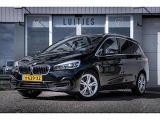BMW 2-serie Tourer 218i 7pers. High-Executive I Pano I Leder I Camera I 1e-eig I NL-auto I Dealer-onderhouden