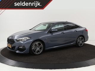 BMW 218i M Sport | Stoelverwarming | Adaptive cruise | Carplay | Trekhaak | Sportstoelen | DAB | Half leder | Live Cockpit | Climate control