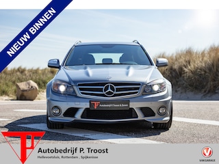 Mercedes-Benz C-klasse Estate 63 Origineel NL/Volledig onderhouden/Panoramadak/Navigatie/Elektrische & verwarmde stoelen/Climate control/Cruise control/Lichtmetalen velgen/Harman-Kardon installatie/Keyless entry/Elektrische kofferbak/Elektrische, inklapbare & verwarmde spiegel