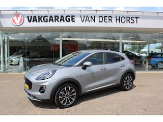 Ford Puma 1.0-125pk EcoBoost Mild-Hybrid Titanium X. Garantie t/m 07-03-2028 ! Slechts 7.400km ! Cruise cntrl, climate cntrl, stoel-, stuur- en voorraamverw., draadloos opladen telefoon, trekhaak afneembaar, navigatie, telefoonvoorb., LM wielen, B&O soundsyst., digitaal dashboard etc.