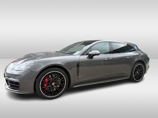 Porsche Panamera Sport Turismo 2.9 4 E-Hybrid / Panoramadak / 360Camera / Achterasbesturing / 21'' / Sportdesign + Chrono / Bose / Sportuitlaat / Luxe Leder / DAB / Stuurverwarming / Stoelverwarming 4x / Navigatie / DAB / Cruise Control