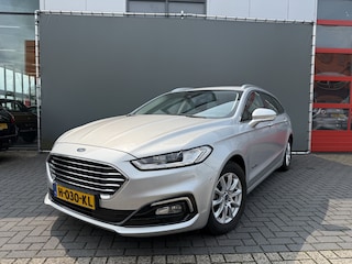Ford Mondeo Wagon BWJ 2020 2.0 141 PK IVCT HEV Titanium AUTOMAAT / APPLE CARPLAY / ANDROID AUTO / NAVI / CLIMA / ADPATIVE CRUSE / STOELVERW. / VOORRUITVERW. / ELEKTRISCHE ACHTERKLEP / ELEKTRISCHE STOELVERW. / CAMERA / LMV / PDC