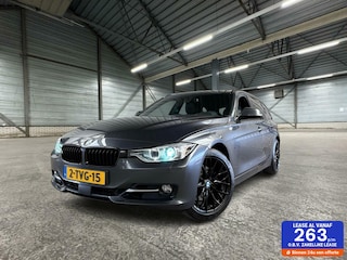 BMW 3-serie Touring 328i xDrive High Executive | Trekhaak | OH Compleet