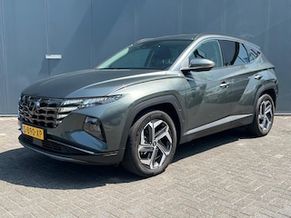 Hyundai Tucson 1.6 T-GDI PHEV 265pk Comfort Smart 4WD 1.6 T-GDI PHEV 265pk Comfort Smart 4WD | Climate | Camera | Carplay | Keyless | Navigatie | Full - Led | Elek. Klep | Winterpakket | 19" Lichtmetaal | Digitale Cockpit | Parkeer Assistent | Adapt. Cruisecontrol