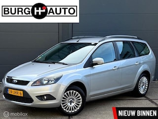 Ford Focus Wagon 1.8 Titanium Flexi Fuel - ECC - NAVI - CRUISE CONTROLE - TREKHAAK - PARKEERSENSOREN - BLUETOOTH - VERWARMDE VOORRUIT - LM VELGEN - 2E EIGENAAR - NL AUTO - NAP - APK T/M 08-05-2026 -