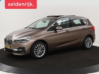 BMW 2-serie Tourer 218i High Executive | Panoramadak | Head-up | Leder | Stoelverwarming | Cruise control | Camera | Climate control | LMV 17 inch