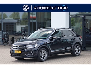 Volkswagen T-Roc 1.5 TSI R-Line Achteruitrijcamera trekhaak afneembaar privacy glas alarm ergo stoelen met leder alcantara stoel en stuurwiel verwarming ACC park assist navigatie 17" LMV valencia spiegel pakket