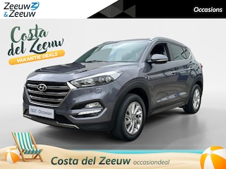 Hyundai Tucson 1.6 GDi Premium | Zeer nette auto | Navigatie | Dodehoek detectie | Trekhaak | Achteruitrijcamera | Cruise control | Stoelverwarming | Stuurwiel verwarmd | 17" lichtmetalen velgen | Parkeersensor achter | Privacy glas |