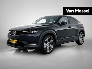 Mazda MX-30 e-SkyActiv 145 Luxury 36 kWh | Adaptieve Cruise | Head-up Display | Dodehoekdetectie | Navigatie | Apple CarPlay | Premium Audio | Verwarmde Stoelen | Stuurwiel Verwarmd | Parkeersensoren | Keyless Entry | LED Koplampen | Schuifdak |