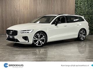 Volvo V60 T6 AWD Recharge R-Design | Schuifdak | Trekhaak | 360° Camera | Harman Kardon | Standkachel met Volvo On Call App | Stoelverwarming voor+achter | Stuurwielverwarming | BLIS Dode Hoek Detectie | Lederen bekleding | Zitting verlenging voorstoelen | Cruise C