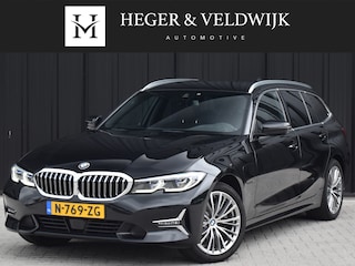 BMW 3-serie Touring 320e xDRIVE BUSINESS EDITION PLUS | LEDER | CARPLAY | TREKHAAK | CAMERA | LED | ADAPTIVE CRUISE CONTROL