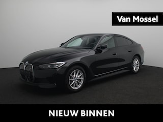 BMW i4 eDrive35 70 kWh | Aut. | Leder | Getint Glas | Led | Navigatie | Cruise control | Climate control | Apple carplay | DAB | Camera | Elek. klep
