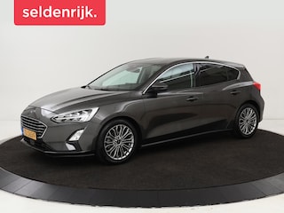 Ford Focus 1.0 EcoBoost Titanium | Stoel & stuurverwarming | Camera | Adaptive cruise | Carplay | B&O Sound | Navigatie | Full LED | Climate control