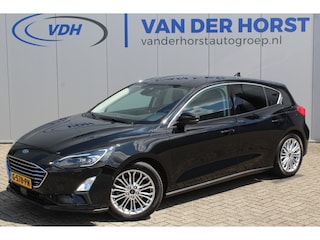 Ford Focus 1.0-125pk EcoBoost Titanium. Erg nette, luxe en goed onderhouden Ford Focus. Volautm. airco dual, stoel-, stuur- en voorraamverw., trekhaak, Xenon verl., LM wielen, navigatie, telefoonvoorb., adaptieve cruise cntrl, keyless entry/keyless go etc, etc.