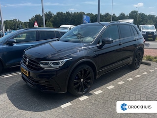 Volkswagen Tiguan 1.4 TSI eHybrid R-Line | 20'' | Panoramadak | Adaptieve cruise | LED | BTW-Auto | Camera | Winter-pack | Trekhaak | Privacy-glass | Cruise control adaptief met Stop&Go | DAB ontvanger | Extra getint glas