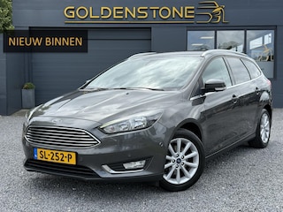 Ford Focus Wagon 1.0 Titanium 2e Eigenaar,125pk,Navi,Trekhaak,Stuurverwarming,Stoelverwarming,6 Bak,Pdc,Lmv,Apk tot 04-2026