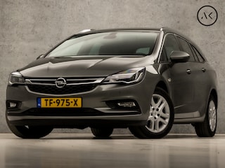 Opel Astra Sports Tourer 1.0 Sportline (APPLE CARPLAY, NAVIGATIE, GETINT GLAS, CHROOM PAKKET, XENON, SPORTSTOELEN, BLUETOOTH, CRUISE CONTROL, NIEUWSTAAT)