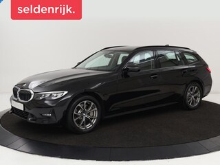BMW 330e Sport Line | Stoelverwarming | Half leder | Carplay | Sportstoelen | Live Cockpit | Sfeerverlichting | Navigatie | Full LED