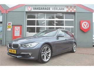 BMW 3-serie Touring 320i High Executive trekhaak. leder. 12 mnd. gar.