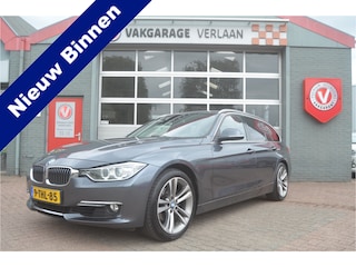 BMW 3-serie Touring 320i High Executive trekhaak. leder. 12 mnd. gar.