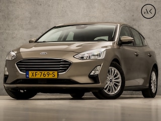 Ford Focus 1.0 EcoBoost Titanium Business Automaat (APPLE CARPLAY, GROOT NAVI, STUUR/STOELVERWARMING, ADAPTIVE CRUISE, SPORTSTOELEN, CLIMATE, TREKHAAK, GETINT GLAS, CAMERA, NIEUWE APK, NIEUWSTAAT)