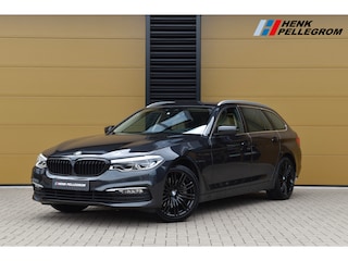 BMW 5-serie Touring 540i xDrive High Executive * Comfortstoelen * Trekhaak * Grootlicht assistent * Stoelverwarming *