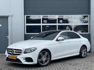 Mercedes-Benz E-klasse 220d AMG | Panoramadak | Widescreen | Multibeam LED | Camera | Stoelverwarming