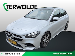 Mercedes-Benz B-klasse 180 Business Solution AMG | Uitklapbare trekhaak | Panoramadak | Apple CarPlay/Android Auto | Metaalkleur