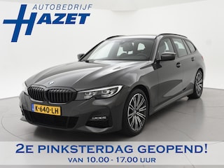 BMW 3-serie Touring 318i AUT. M-SPORT DRAVITGRAU + SPORTSTOELEN | CAMERA | MEMORY | HIFI | SFEERVERLICHTING | CARPLAY