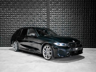 BMW 3-serie Touring 330e | 5 x M Perf. parts | M Tech. stoelen |DCC | H/K | Carbon | Pano | HUD | Ad. Li. | Memo | Amb. |
