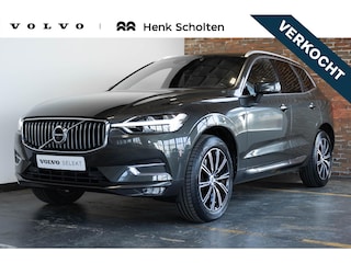 Volvo XC60 B5 Automaat Business Pro | Trekhaak | 360° parkeercamera | Adaptive cruise control | BLIS | Stoelverwarming | Stuurwielverwarming | Navigatie | Maroon lederen bekleding | Comfortstoelen |