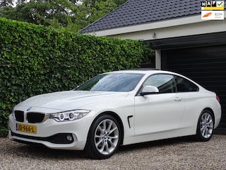 BMW 4-serie Coupé 420i Essential | Automaat | N.A.P. | BTW | 1e eigenaar | Xenon | Navi