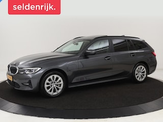 BMW 330e | Panoramadak | Trekhaak | Stoel & stuurverwarming | Adaptive cruise | Head-Up | LaserLight | Carplay | Live Cockpit | Half leder | Navigatie