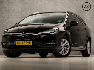 Opel Astra Sports Tourer 1.4 Innovation 150Pk (APPLE CARPLAY, GROOT NAVI, CLIMATE, CAMERA, GETINT GLAS, LEDER, SPORTSTOELEN, KEYLESS, LED KOPLAMPEN, LANE ASSIST, NIEUWSTAAT)