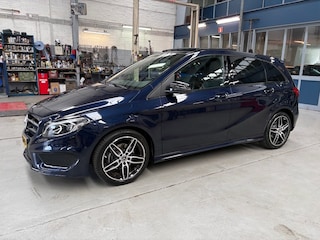Mercedes-Benz B 180 122PK 7G-DCT Ambition | Schuif- Kanteldak | Navigatie | Cruise control | PDC V+A | Climate control | All season banden | NAP | Rijklaar prijs!