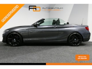 BMW 2-serie Cabrio 218i Essential / Stoelverwarming / Windscherm / Climatronic / 19'' LMV / Parkeersensoren achter / BMW Radio Professional / Licht- & regensensor / Multimedia systeem
