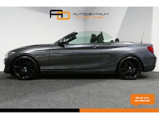 BMW 2-serie Cabrio 218i Essential / Stoelverwarming / Windscherm / Climatronic / 19'' LMV / Parkeersensoren achter / BMW Radio Professional / Licht- & regensensor / Multimedia systeem