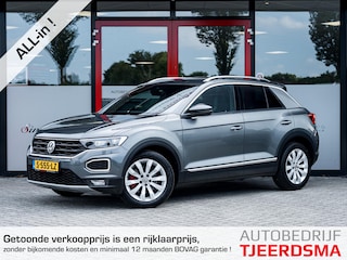 Volkswagen T-Roc 1.5 TSI Sport | Trekhaak | Stoelverwarming | Navigatie | Climate Control | Adaptieve Cruise Control | Apple Carplay | Android Auto | Metallic Lak | Privacy Glas | Lichtmetalen Velgen | Parkeersensoren |