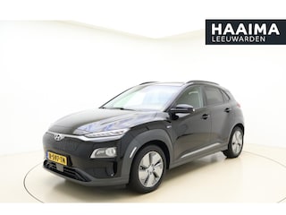 Hyundai Kona EV Premium Sky 64 kWh | Navigatie | Trekhaak | Climate control | Stoel & Stuurverwarming | Extra getint glas | Half leder | Keyless | Cruise control